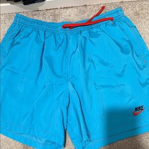 Nike Men's Aqua Blue Shorts with Red Accents